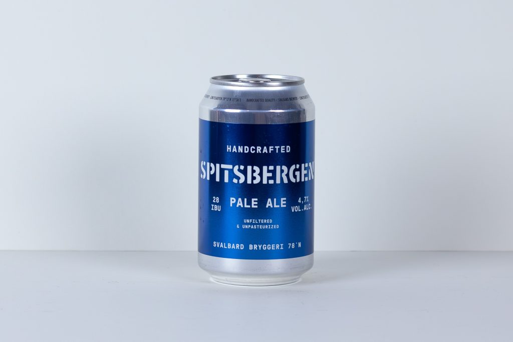 Blue Spitsbergen Pale Ale beer can centered on a white surface against a pale background label clearly visible